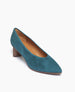 Coclico Wumo Heel in Bottle suede, a seasonless slip-on heel with a choked throat line, subtle stichwork and a scultped, oval shaped solid wood heel with a hand-painted chestnut finish - angle view.  2