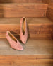 Coclico Wynne Pump in Dusk Suede lying on wooden stairs.  6
