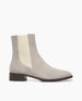 Side view of the Coclico Mito Boot in Tortora suede: a flat-heeled chelsea boot in Italian suede with a 1 inch solid wood heel and leather sole and rounded toe. 1