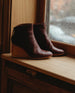 Pair of Coclico Lovage Boot in Burgundy leather on window sill - sunlit side view  4