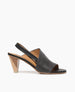 Coclico women's peep-toe slingback sandal in black veg tanned leather with a solid two-tone wood heel. Coclico shoes are sustainably made in Spain. 1