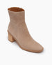 Angle view of the Coclico Babe Boot in Latte nubuck, a mid-height wood block heel, round toe, inside zip closure.  2