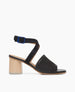 Coclico women's peep-toe ankle strap sandal in black veg tanned leather with a solid two-tone wooden heel. Coclico shoes are sustainably made in Spain. 1