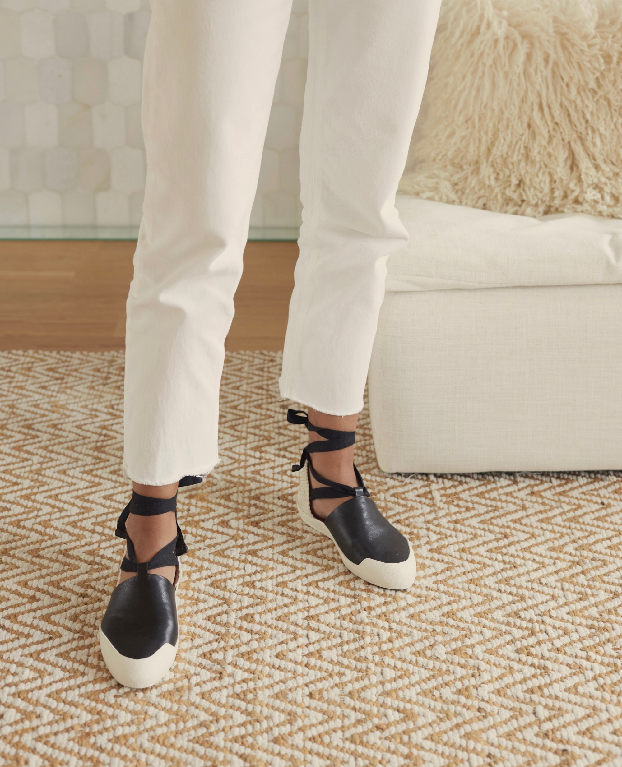 Close up of Coclico Kashm Sneaker in Black leather.