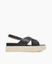 Coclico women's summer platform slingback sandal in black leather with a creamy white flatform sole. Coclico shoes are sustainably made in Spain. 1