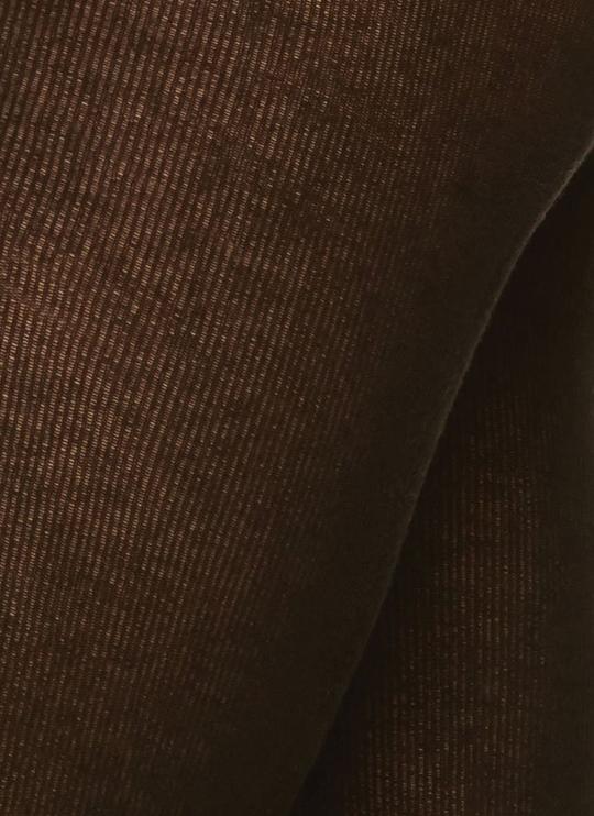A close-up view of a brown, ribbed fabric with a soft texture and a snug fit, likely part of a garment such as tights or leggings.