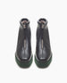 Coclico Chickadee Shearling Boot in Black leather, top view: weather-conscious leather, upper zipper closure, shearling lining, padded edge, green mid-height EVA sole. 6