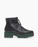 Side view of Coclico Chickadee Shearling Boot in Black leather: weather-conscious leather, upper zipper closure, shearling lining, padded edge, green mid-height EVA sole. 1