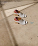 Coclico women's striking white snake embossed leather full coverage sandal with a contrasting burgundy elastic slingback and a sculpted wood heel. Coclico shoes are sustainably made in Spain. 6